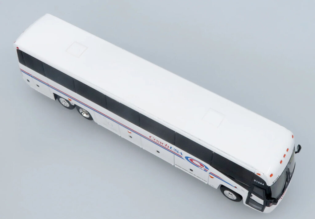 Iconic Replicas MCI D4520 Coach USA New York 87-0652